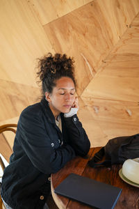 Woman using a digital tablet with an electronic pen.