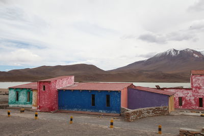View of mountain range against cloudy sky