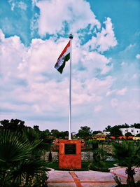 Low angle view of flag against sky