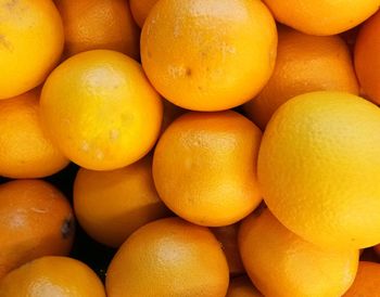 Full frame shot of oranges in market