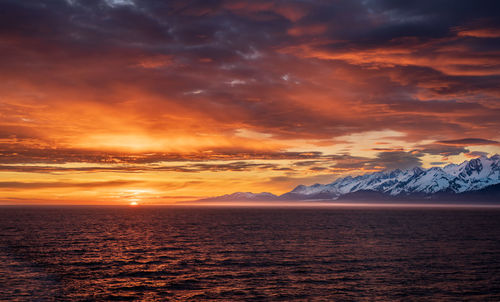 Scenic view of sea against sky during sunset