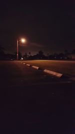 Illuminated street light at night