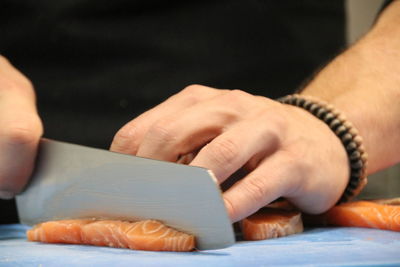 Close-up of man holding hands