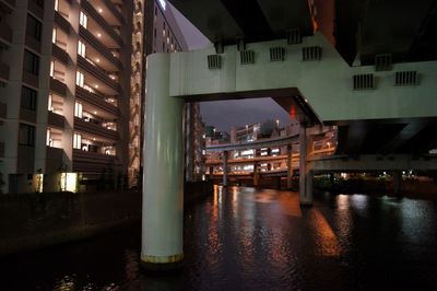 Illuminated buildings in city at night