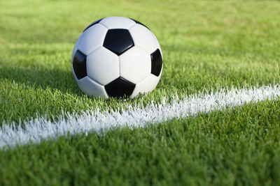 Soccer ball on grassy field