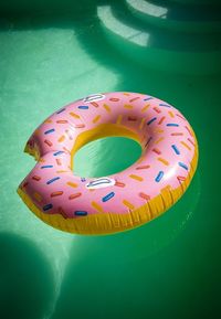 High angle view of multi colored floating on table