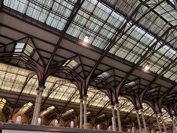 Low angle view of illuminated ceiling at railroad station