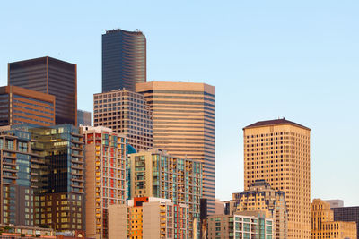 Low angle view of buildings against clear sky