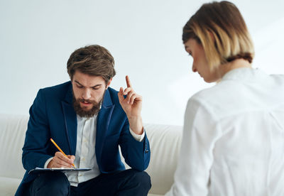 Business colleagues working at office