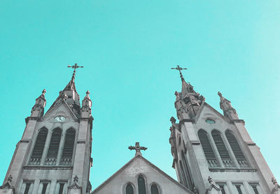 Low angle view of cathedral against clear blue sky