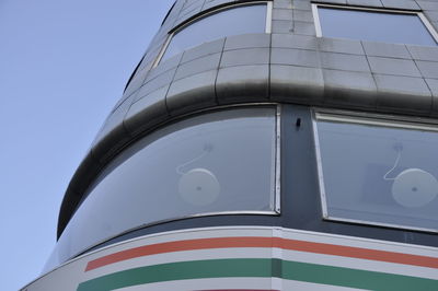 Low angle view of building against clear blue sky