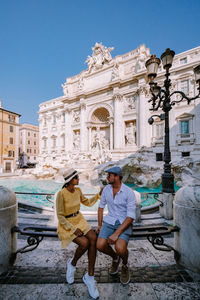 Couple against historical building