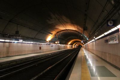 Illuminated railroad station platform