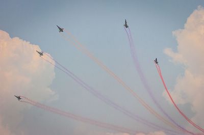 Low angle view of airplane flying in sky