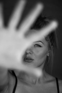 Close-up portrait of young woman looking away