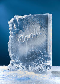 Close-up of ice crystals against blue background