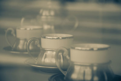 Close-up of coffee cup on table