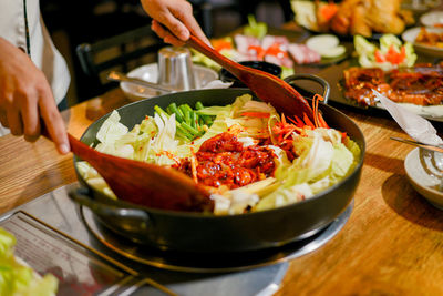 Close-up of person preparing food