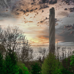 Scenic view of silhouette trees against sky during sunset