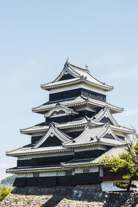 Low angle view of matsumoto castle in japan