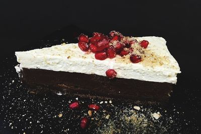 Close-up of ice cream against black background