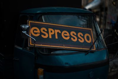 Espresso sign placard on vehicle