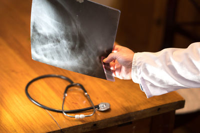 Close-up of doctor holding x-ray