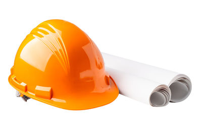 Close-up of orange hat against white background