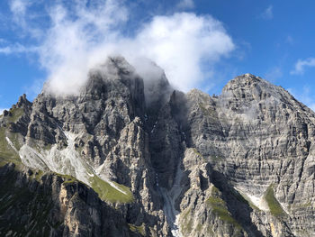 Scenic view of rocky mountains against sky