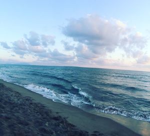 Scenic view of calm sea against sky