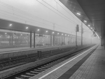 Railroad station platform at night