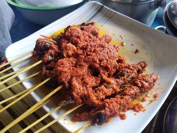 High angle view of meat in cooking pan