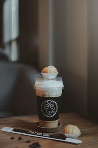 Close-up of coffee cup on table