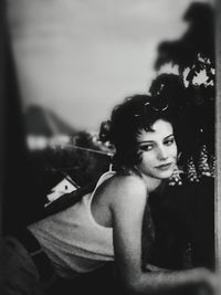 Portrait of young woman looking away