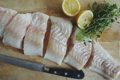 Directly above shot of sliced fish on cutting board