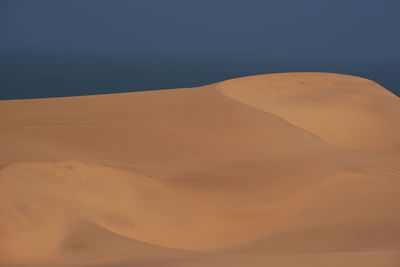 Scenic view of desert against sky