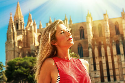 Beautiful woman in front of church