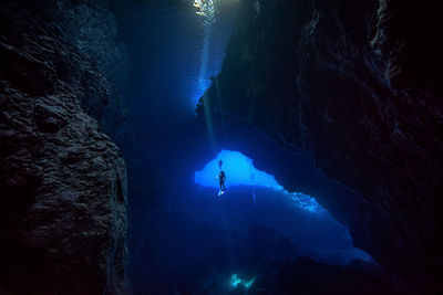 Person swimming in sea