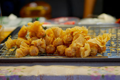 Close-up of serving food on table