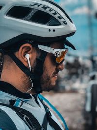 Close-up portrait of man wearing sunglasses