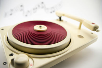 Close-up of turntable against gray background