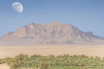 Scenic view of desert against clear sky