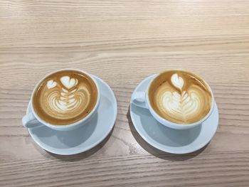 Close-up of cappuccino on table