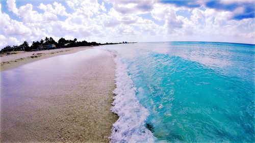 Scenic view of beach against sky