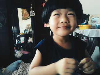 Portrait of cute boy at home