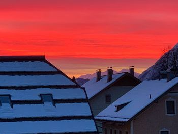 Low angle view of building against sky during sunset