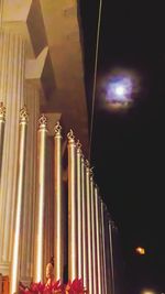 Low angle view of illuminated candles in temple