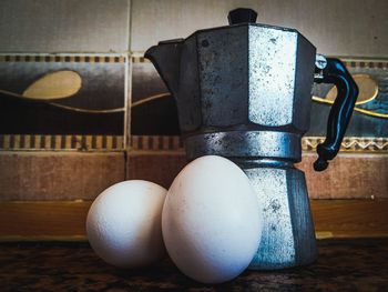 Close-up of eggs on table at home