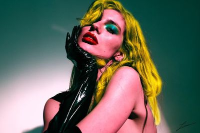 Portrait of young woman with face paint