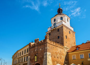 Low angle view of building against blue sky